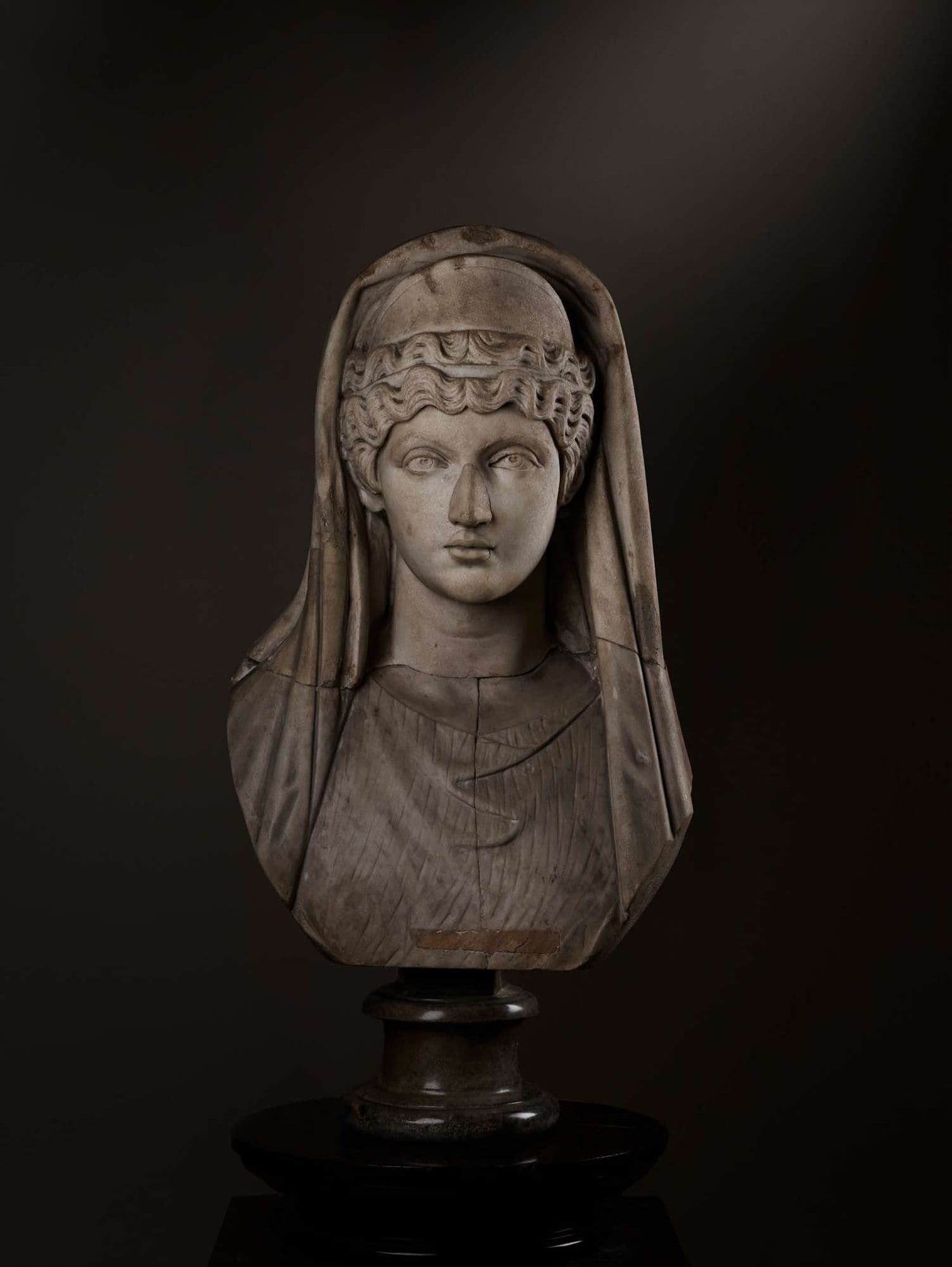 ROMAN OVER-LIFE-SIZE MARBLE PORTRAIT HEAD OF FAUSTINA THE ELDER